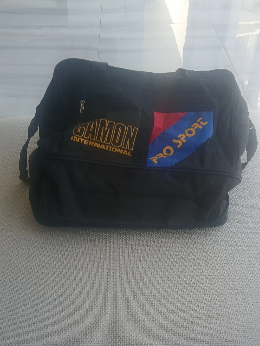 Camo Black Duffel with Red and Blue Accents
